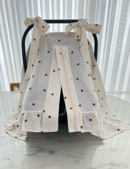 Puset örtüsü with a soft fabric and colorful patterns designed for stroller coverage.